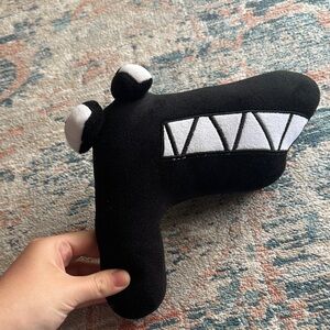 Black and White Plush Monster Toy